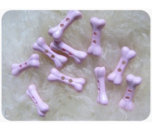 Knöpfe Knochen rosa
