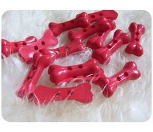 Knöpfe Knochen rot