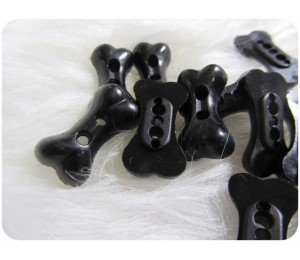 Knöpfe Knochen schwarz
